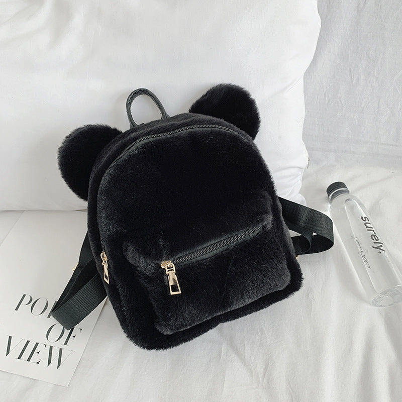 Kleiner Damenrucksack aus weichem Cordstoff im Plüsch-Stil, mit Sandwich-Außentasche und Doppelträgern – ideal für Herbst und Winter