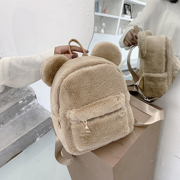 Kleiner Damenrucksack aus weichem Cordstoff im Plüsch-Stil, mit Sandwich-Außentasche und Doppelträgern – ideal für Herbst und Winter