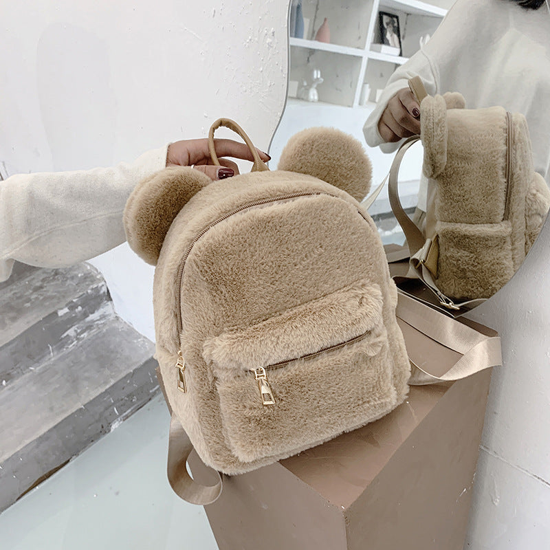 Kleiner Damenrucksack aus weichem Cordstoff im Plüsch-Stil, mit Sandwich-Außentasche und Doppelträgern – ideal für Herbst und Winter
