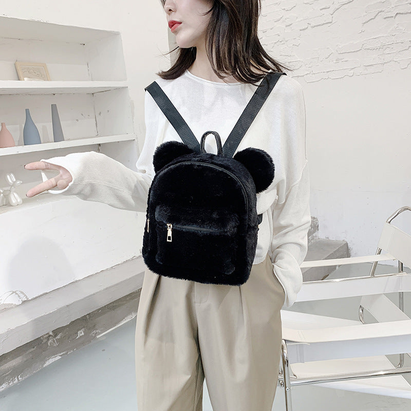 Kleiner Damenrucksack aus weichem Cordstoff im Plüsch-Stil, mit Sandwich-Außentasche und Doppelträgern – ideal für Herbst und Winter