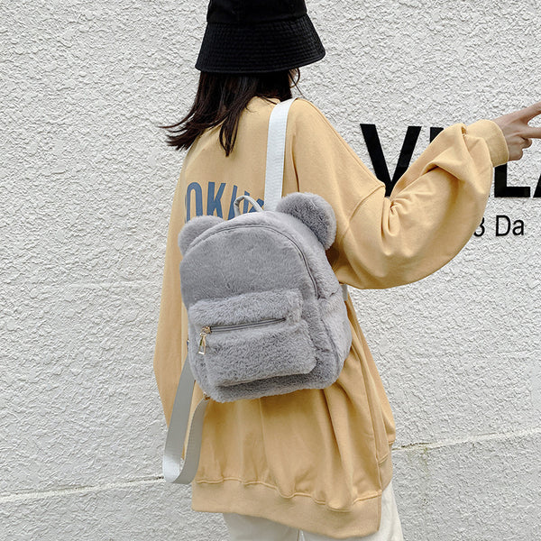 Kleiner Damenrucksack aus weichem Cordstoff im Plüsch-Stil, mit Sandwich-Außentasche und Doppelträgern – ideal für Herbst und Winter
