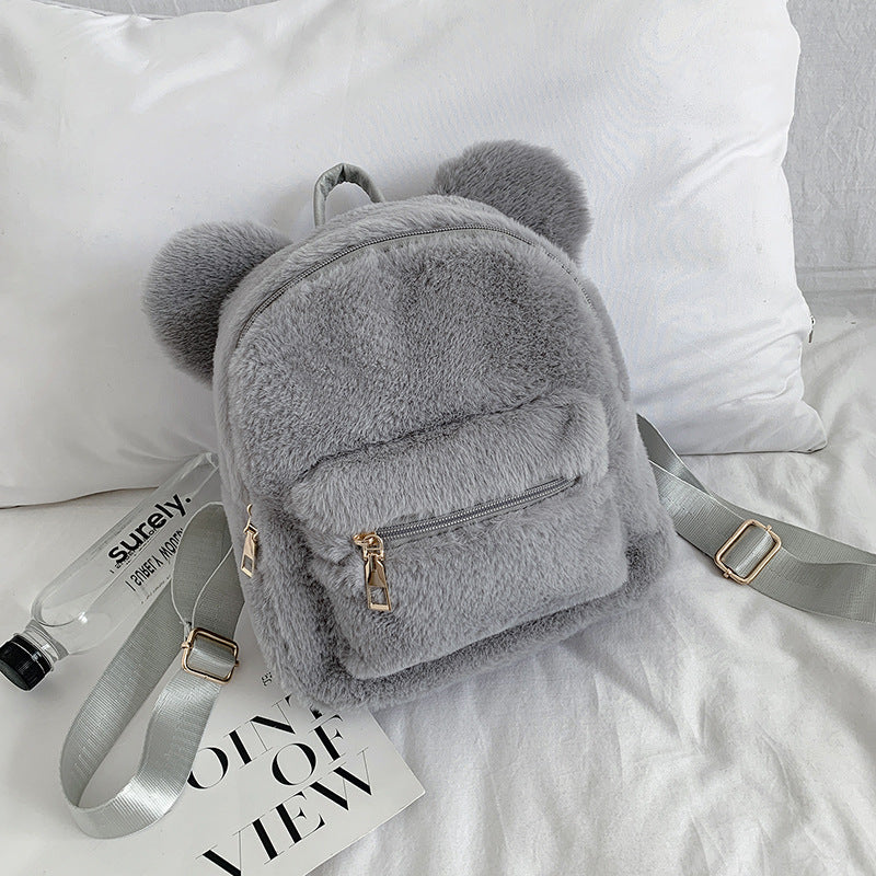 Kleiner Damenrucksack aus weichem Cordstoff im Plüsch-Stil, mit Sandwich-Außentasche und Doppelträgern – ideal für Herbst und Winter